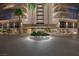 Elegant building entrance with manicured landscaping and prominent signage for 'Regency Towers' at 3111 Bel Air Dr # 3C, Las Vegas, NV 89109