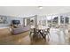 Open living and dining area featuring contemporary decor and access to outdoor views at 3111 Bel Air Dr # 3C, Las Vegas, NV 89109