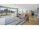 Bright living room with large windows offering pool views and comfortable modern furnishings at 3111 Bel Air Dr # 3C, Las Vegas, NV 89109