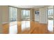 Bright, spacious bedroom with wood floors and large balcony windows offering city views at 322 Karen Ave # 708, Las Vegas, NV 89109