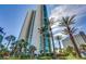 Towering high-rise condo surrounded by palm trees and greenery at 322 Karen Ave # 708, Las Vegas, NV 89109