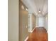 Hallway with hardwood flooring and recessed lighting leading to bedrooms and bathrooms at 322 Karen Ave # 708, Las Vegas, NV 89109