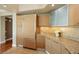 Bright kitchen featuring granite countertops, stainless steel appliances, and wooden cabinetry at 322 Karen Ave # 708, Las Vegas, NV 89109