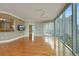 Elegant living room with floor to ceiling windows that provide city views and wood floors at 322 Karen Ave # 708, Las Vegas, NV 89109