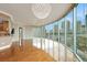 Spacious living room with floor to ceiling windows that offer city views and hardwood floors at 322 Karen Ave # 708, Las Vegas, NV 89109