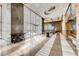 Elegant lobby with high ceilings, marble floors, and stylish furnishings at 322 Karen Ave # 708, Las Vegas, NV 89109