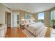 Bright main bedroom boasts great views, a walk-in closet, and an ensuite bathroom at 322 Karen Ave # 708, Las Vegas, NV 89109