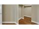 Spacious walk-in closet with wood floors and open shelving at 322 Karen Ave # 708, Las Vegas, NV 89109
