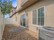 Low maintenance backyard with patio, rock landscaping, and privacy fence at 3795 Canis Minor Ln # 5102, Henderson, NV 89052