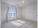 Well-lit bedroom with large window and neutral carpet at 3795 Canis Minor Ln # 5102, Henderson, NV 89052