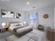 Featuring a staged bedroom with a large bed, side tables, and decor at 3795 Canis Minor Ln # 5102, Henderson, NV 89052
