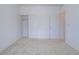 Neutral bedroom showing a double closet and single closet/door at 3795 Canis Minor Ln # 5102, Henderson, NV 89052