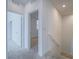 Upstairs hallway with neutral carpet leading to bedrooms at 3795 Canis Minor Ln # 5102, Henderson, NV 89052