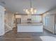 Bright kitchen features a large island, stainless steel appliances, and stylish lighting fixtures at 3795 Canis Minor Ln # 5102, Henderson, NV 89052