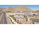 Aerial view showcasing desert community with mountain views and nearby amenities at 4001 Turquoise Falls St, Las Vegas, NV 89129