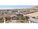 Aerial view of a well-kept neighborhood with mature landscaping and desert surroundings at 4001 Turquoise Falls St, Las Vegas, NV 89129