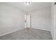 Bedroom with plush carpet and a view through the doorway to other rooms at 4001 Turquoise Falls St, Las Vegas, NV 89129