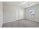 Spacious bedroom with sliding closet doors and a window providing natural light at 4001 Turquoise Falls St, Las Vegas, NV 89129