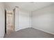 This bedroom offers a closet, neutral paint, and plush carpeting at 4001 Turquoise Falls St, Las Vegas, NV 89129