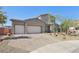 Contemporary two-story home featuring a three-car garage and meticulous landscaping at 4001 Turquoise Falls St, Las Vegas, NV 89129