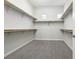 Spacious walk-in closet with ample shelving and storage options, perfect for organizing wardrobes and accessories at 4001 Turquoise Falls St, Las Vegas, NV 89129