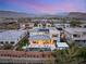 Beautiful modern home featuring a pool, solar panels, covered patio with mountain views in a desert community at 4208 Lapis Ridge Ct, Las Vegas, NV 89135