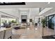 Spacious living room with fireplace, high ceilings, and seamless indoor-outdoor living at 4208 Lapis Ridge Ct, Las Vegas, NV 89135