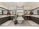 Spacious main bathroom featuring a freestanding tub, dual vanities, and elegant lighting for relaxation at 4208 Lapis Ridge Ct, Las Vegas, NV 89135