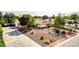 Charming single-story home featuring a low-maintenance desert landscape and a spacious driveway with ample parking at 4343 Sharpshooter Ln, North Las Vegas, NV 89031