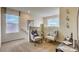 Cozy loft area with comfortable seating, natural light, and minimalistic decor at 4420 Stardusk Falls Ave, North Las Vegas, NV 89084
