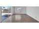 Bright living room featuring tiled floors and a sliding glass door to the backyard at 4770 Via San Andros, Las Vegas, NV 89103