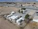 Aerial view of a mobile home park featuring well-maintained lots with a desert backdrop at 4861 Pahrump Valley Blvd, Pahrump, NV 89048