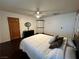 Bedroom with hardwood floors and a ceiling fan at 4861 Pahrump Valley Blvd, Pahrump, NV 89048