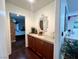 Hallway with wood floors and view into main bedroom at 4861 Pahrump Valley Blvd, Pahrump, NV 89048