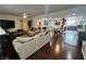 Open floor plan with views of the dining area, hardwood floors, and neutral colored furnishings at 4861 Pahrump Valley Blvd, Pahrump, NV 89048