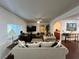 Bright living room boasting hardwood floors, neutral furnishings, and lots of natural light at 4861 Pahrump Valley Blvd, Pahrump, NV 89048