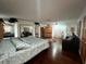 Large main bedroom with hardwood floors and sitting area at 4861 Pahrump Valley Blvd, Pahrump, NV 89048