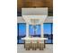 Modern bar area features sleek countertops, stylish seating, and stunning views of the cityscape at 49 Crested Cloud Way, Las Vegas, NV 89135