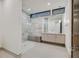 Bathroom with a glass enclosed shower and lots of bright light at 49 Crested Cloud Way, Las Vegas, NV 89135