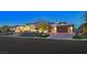 Contemporary home showcasing a modern design, well-manicured landscaping, and a spacious driveway at 49 Crested Cloud Way, Las Vegas, NV 89135