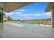 A modern backyard with a gorgeous infinity pool and lush landscaping in a desert community at 49 Crested Cloud Way, Las Vegas, NV 89135
