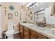 Bathroom featuring stylish decor, granite countertops, and modern fixtures at 5205 Sandy Cactus Ln, Las Vegas, NV 89149