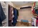 Walk-in closet with shelving and rods for organized storage at 5205 Sandy Cactus Ln, Las Vegas, NV 89149