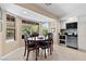 Eat-in kitchen featuring views, a breakfast table, and ample natural light at 5205 Sandy Cactus Ln, Las Vegas, NV 89149