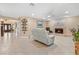 Spacious living room with neutral tones, fireplace, and backyard access at 5205 Sandy Cactus Ln, Las Vegas, NV 89149