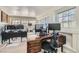 Bright office space with multiple workstations and natural light at 5205 Sandy Cactus Ln, Las Vegas, NV 89149
