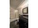 Contemporary bathroom with a granite countertop vanity and a shower with glass doors at 5256 Harvest Breeze Rd, Las Vegas, NV 89118