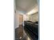 Modern bathroom showcasing a double vanity with vessel sinks and dark granite countertops at 5256 Harvest Breeze Rd, Las Vegas, NV 89118