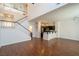 Spacious living area featuring wood floors, high ceilings and open concept design at 5256 Harvest Breeze Rd, Las Vegas, NV 89118