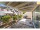 The patio offers a cozy outdoor space with shade and convenient grill placement at 5256 Harvest Breeze Rd, Las Vegas, NV 89118